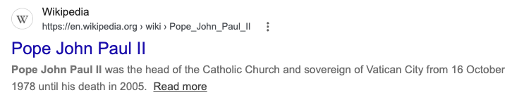 Google result for Pope John Paul II showing favicon, site name, URL breadcrumb, title and description